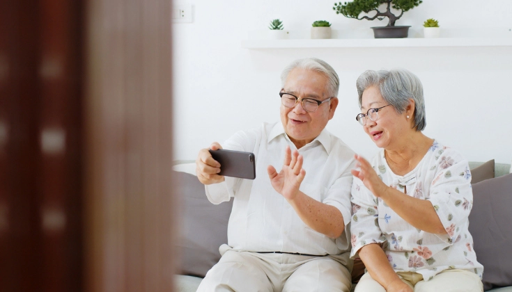 Filipino couple enjoying their home as they grow older